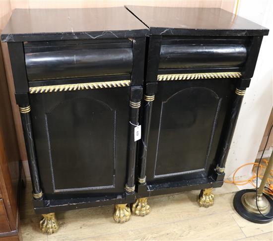 A pair of ebonised cabinets H.104cm